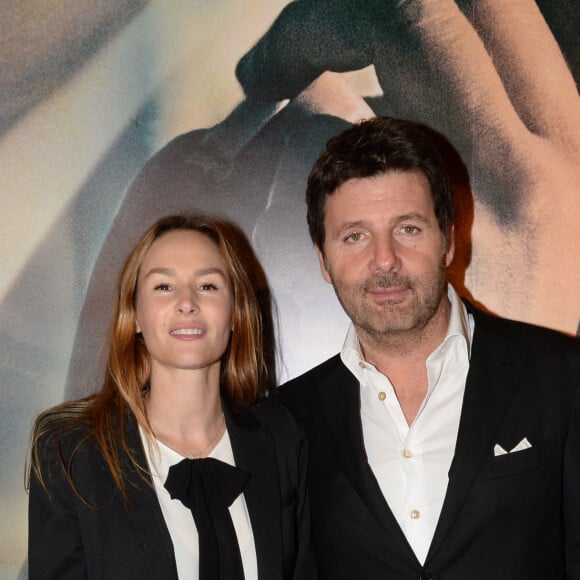 Philippe Lellouche et sa femme Vanessa Demouy lors de l'avant-première du film "La French" au cinéma Gaumont Opéra à Paris, le 25 novembre 2014. 