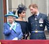 La reine Elisabeth II d'Angleterre, Meghan Markle, duchesse de Sussex (habillée en Dior Haute Couture par Maria Grazia Chiuri), le prince Harry, duc de Sussex - La famille royale d'Angleterre lors de la parade aérienne de la RAF pour le centième anniversaire au palais de Buckingham à Londres. 