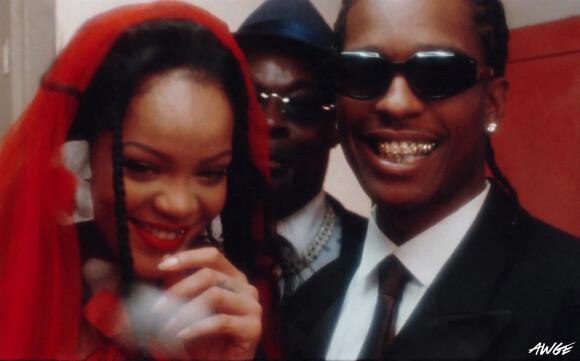 A$AP Rocky demande Rihanna en mariage dans son clip "DMB". Los Angeles. Le 5 mai 2022.  A$AP Rocky ‘D.M.B.' video starring Rihanna. ‘D.M.B.' stands for for Dat's My Bitch'. Asap rocks a retro E.Cantona, Manchester United jersey. The couple rock 'marry me' and 'I do' gold teeth. Los Angeles. May 5th, 2022. 