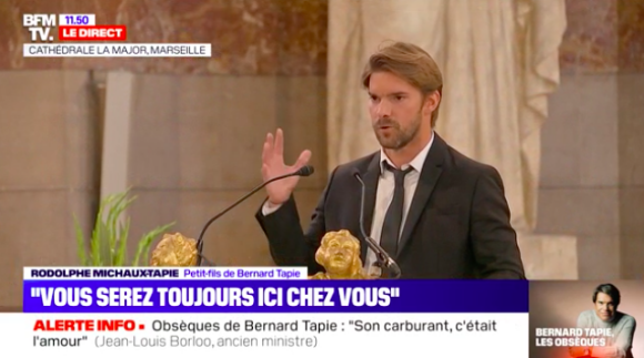 Rodolphe Tapie prononce un discours lors de la messe des obsèques de son grand-père Bernard Tapie.
