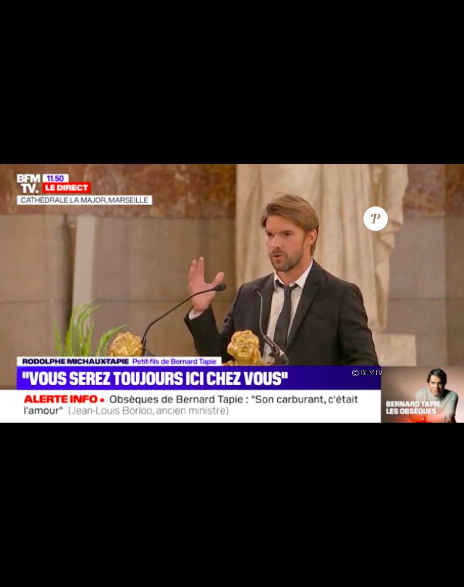 Rodolphe Tapie prononce un discours lors de la messe des obsèques de son grand-père Bernard Tapie.