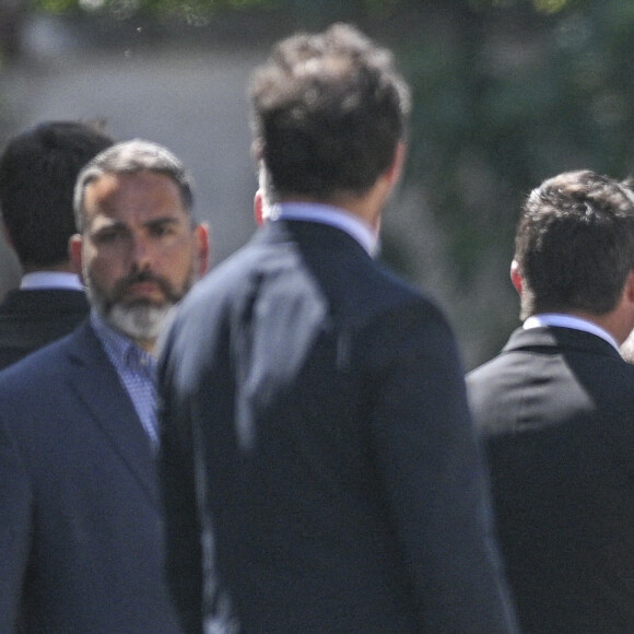 La Première Dame française, Brigitte Macron et José Pietroboni, chef du protocole - Obsèques d'Antoine Alléno (fils du chef cuisinier français, trois étoiles au Guide Michelin Yannick Alléno) en la collégiale Notre-Dame de Poissy, France, le 13 mai 2022. © Jean-Baptiste Autissier/Panoramic/Bestimage 