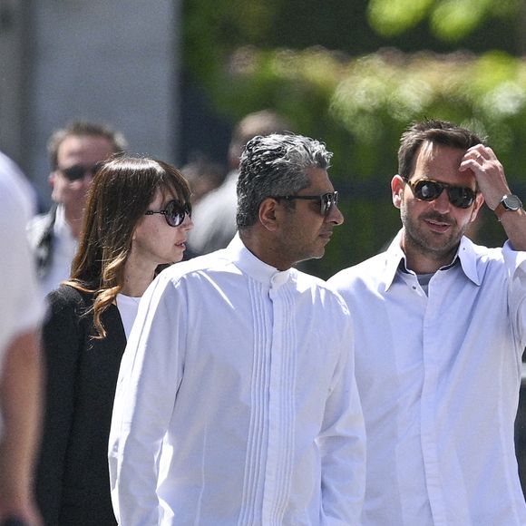 Le chef pâtissier Christophe Michalak et sa femme Dephine - Obsèques d'Antoine Alléno (fils du chef cuisinier français, trois étoiles au Guide Michelin Yannick Alléno) en la collégiale Notre-Dame de Poissy, France, le 13 mai 2022. © Jean-Baptiste Autissier/Panoramic/Bestimage 