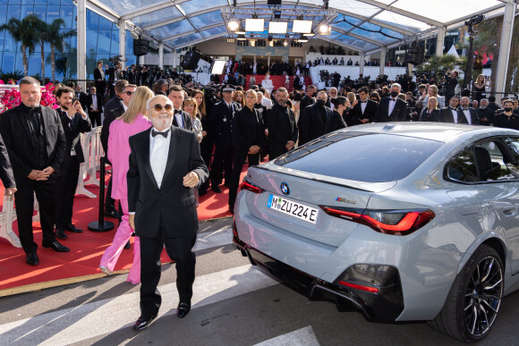 Exclusif - Patricia Campi et Gérard Jugnot - Arrivées des célébrités à bord des voitures officielles pour la montée des marches du film "Coupez !" à l'occasion de la cérémonie d'ouverture du 75ème Festival International du Film de Cannes le 17 mai 2022. 