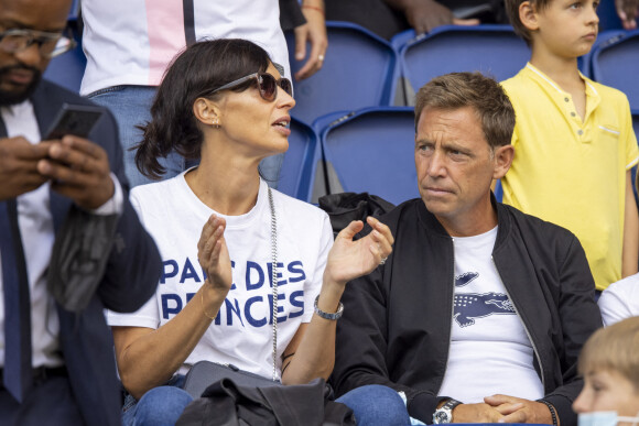 Daniel Riolo et sa compagne Géraldine Maillet - People en tribune lors de la rencontre de football Paris Saint Germain PSG contre Clermont (4-0) au Parc des Princes à Paris le 11 septembre 2021