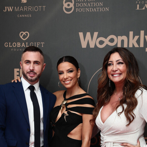 Thierry Martino, Eva Longoria, Maria Bravo - Photocall du Global Gift Gala lors du 75ème Festival International du Film de Cannes le 19 mai 2022. © Tiziano Da Silva / Bestimage