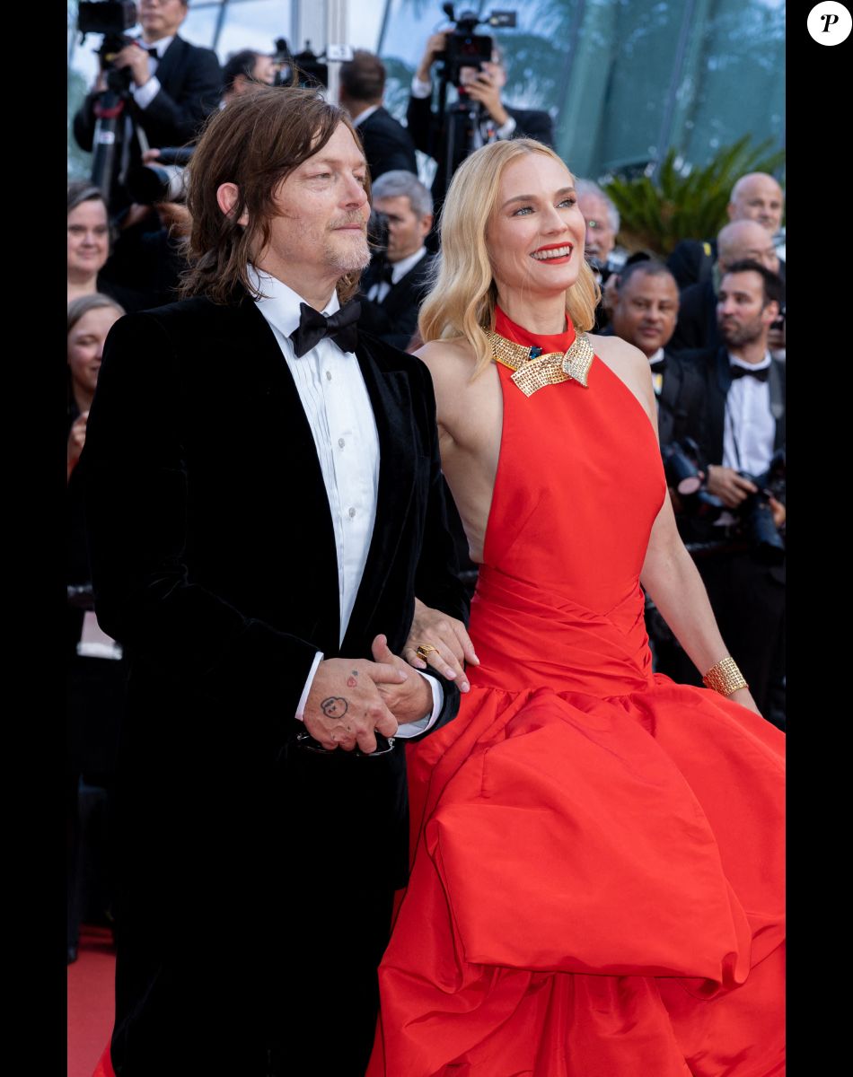 Norman Reedus et sa compagne Diane Kruger (robe Oscar de la Renta) - Montée des marches du film " L'Innocent " lors du 75ème Festival International du Film de Cannes. Le 24 mai 2022 © Olivier Borde / Bestimage