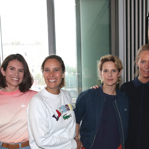 (G-D) Estelle Lefébure, Louise Monot, Julie de Bona, Elodie Navarre, Johanne Gilbert (directrice de Lacoste) et Mélanie Bernier au village (Jour 3) lors des Internationaux de France de Tennis de Roland Garros 2022, à Paris, France, le 24 mai 2022. © Bertrand Rindoff/Bestimage