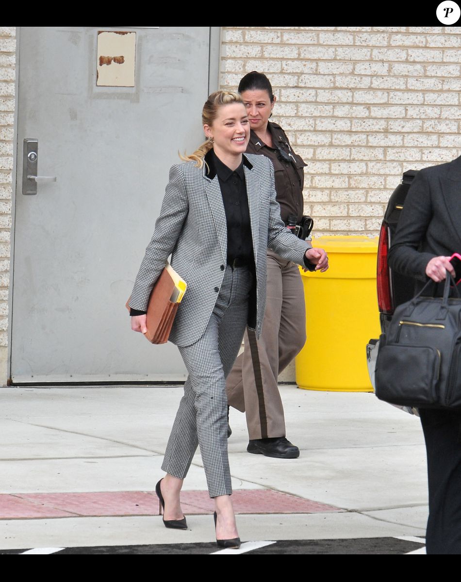 Amber Heard - J.Depp et A.Heard quittent séparément le tribunal de Fairfax lors du procès intenté par l'acteur contre son ex-femme pour diffamation. Le 24 mai 2022.