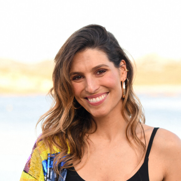 Laury Thilleman - Front row et people lors du défilé Etam Croisière 2022 au Domaine de Murtoli, Corse le 12 mai 2022. © Rachid Bellak / Bestimage
