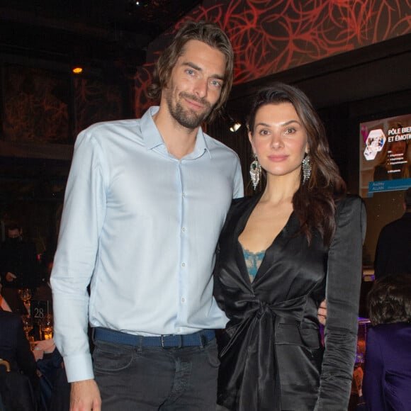 Exclusif - Le nageur Camille Lacourt et sa compagne Alice Detollenaere lors de la soirée de gala de l'Institut Rafaël, maison de l'après Cancer, au Pavillon Gabriel à Paris le 13 décembre 2021. © Erez Lichtfeld / Bestimage 