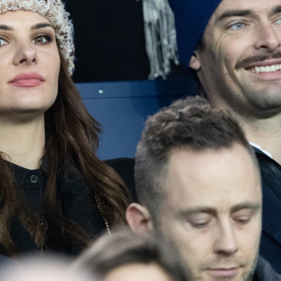 Camille Lacourt et sa compagne Alice Detollenaere (Miss Bourgogne 2010) dans les tribunes lors du match de championnat de Ligue 1 Conforama opposant le Paris Saint-Germain (PSG) aux Girondins de Bordeaux au Parc des Princes à Paris, France, le 23 février 2020. Le PSG a gagné 4-3. © Cyril Moreau/Bestimage 