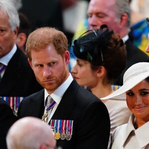 Le prince Harry, duc de Sussex, et Meghan Markle, duchesse de Sussex - Les membres de la famille royale et les invités lors de la messe célébrée à la cathédrale Saint-Paul de Londres, dans le cadre du jubilé de platine (70 ans de règne) de la reine Elisabeth II d'Angleterre. Londres, le 3 juin 2022.