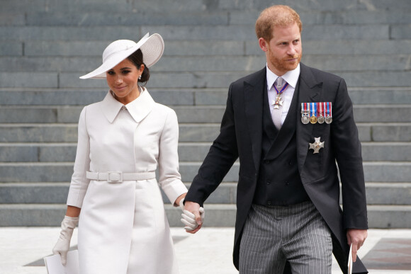 Le prince Harry, duc de Sussex, et Meghan Markle, duchesse de Sussex - Les membres de la famille royale et les invités lors de la messe célébrée à la cathédrale Saint-Paul de Londres, dans le cadre du jubilé de platine (70 ans de règne) de la reine Elisabeth II d'Angleterre. Londres, le 3 juin 2022.