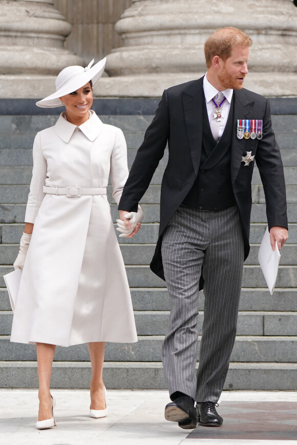 Le prince Harry, duc de Sussex, et Meghan Markle, duchesse de Sussex - Les membres de la famille royale et les invités lors de la messe célébrée à la cathédrale Saint-Paul de Londres, dans le cadre du jubilé de platine (70 ans de règne) de la reine Elisabeth II d'Angleterre. Londres, le 3 juin 2022.