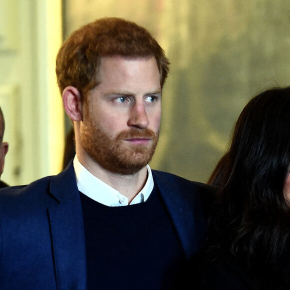 Le prince Harry et sa fiancée Meghan Markle lors d'une réception pour les jeunes au palais de Holyroodhouse à Edimbbourg, Ecosse le 13 février 2018.