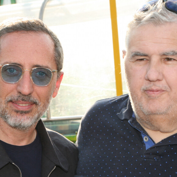 Gad Elmaleh et Pierre Ménès - Inauguration de la "Fête à Neuneu" sur la pelouse de la Muette au Bois de Boulogne, à Paris, le 3 septembre 2021. © JLPPA/Bestimage