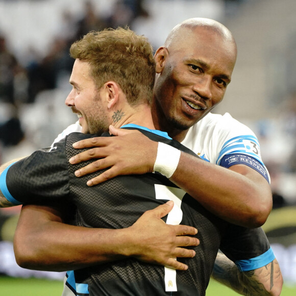 Didier Drogba (OM Legends) - M. Pokora (Matt Pokora) (UNICEF) - Match des héros entre l'équipe OM Legends et l'équipe UNICEF au stade Orange Velodrome à Marseille le 13 octobre 2021. © Norbert Scanella/Panoramic /Bestimage 