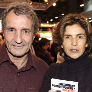 Jean-Jacques Bourdin et sa femme Anne Nivat - 38e salon du livre de Paris à la Porte de Versailles. © Cédric Perrin/Bestimage