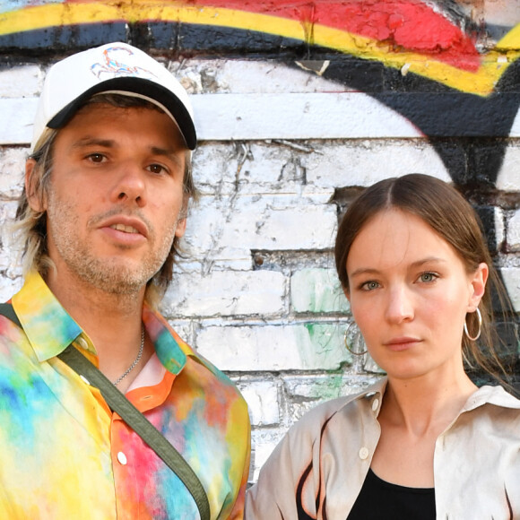 Orelsan (Aurélien Cotentin) et Diane Rouxel au défilé de mode masculine Etudes printemps / été 2023 à Paris le 21 juin 2022. © Veeren / Bestimage 