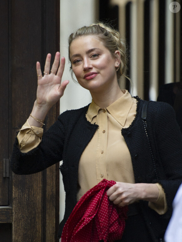 Naissance - Amber Heard est maman d'une petite fille prénommée Oonagh Paige - J. Depp et Amber Heard à leur arrivée à la cour royale de justice à Londres, pour le procès en diffamation contre le magazine The Sun Newspaper.