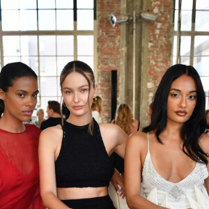 Tina Kunakey, Kristina Romanova et Amina Muaddi - Front Row du défilé de mode Haute-Couture automne-hiver 2022-2023 "Alexandre Vauthier" à Paris le 5 juillet 2022. © Veeren / Christophe Clovis / Besimage