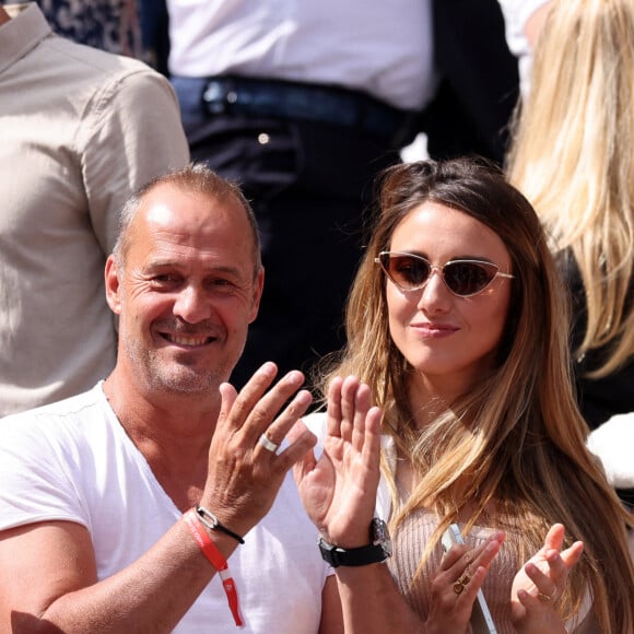 Roger Erhart et sa compagne Delphine Wespiser, Miss France 2012 - Célébrités dans les tribunes des internationaux de France de Roland Garros à Paris le 31 mai 2022. © Cyril Moreau - Dominique Jacovides/Bestimage