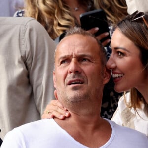 Roger Erhart et sa compagne Delphine Wespiser, Miss France 2012 - Célébrités dans les tribunes des internationaux de France de Roland Garros à Paris le 31 mai 2022. © Cyril Moreau - Dominique Jacovides/Bestimage