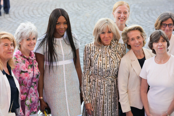 Naomi Campbell et Brigitte Macron au défilé du 14 juillet, sur les Champs-Elysées