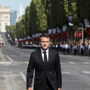 Le président français Emmanuel Macron assiste au défilé du 14 juillet 2022, place de la Concorde, Paris, © Stéphane Lemouton / Bestimage