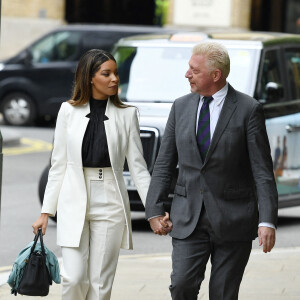 Boris Becker et sa compagne Lilian de Carvalho se rendent au tribunal "Southwark Crown Court" pour le derbnier du jour du procès pour fraude fiscale de Boris Becker. Il encourt jusqu'à 7 ans de prison ferme. Londres, le 29 avril 2022. 