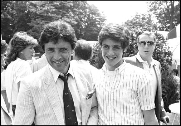 Sacha Distel et son fils Julien à Roland Garros en 1983.