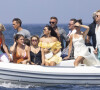 David Beckham, sa femme Victoria et leurs enfants, Harper et Cruz avec sa compagne Tana Holding arrivent en bateau avec des amis dont le coach sportif Bobby Rich sur la plage des Salins à Saint-Tropez où ils vont passer l'après-midi dans une résidence privée.