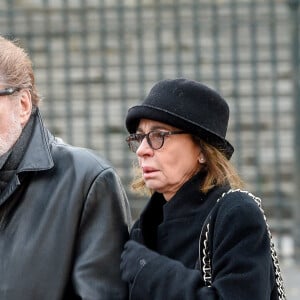 Eddy Mitchell, sa femme Muriel - Sorties de l'église de la Madeleine après les obsèques de Johnny Hallyday à Paris, le 9 décembre 2017. © Coadic Guirec/Bestimage 