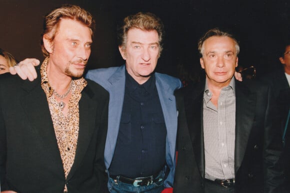 Johnny Hallyday, Eddy Mitchell et Michel Sardou en octobre 1998.