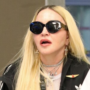 Exclusif - Madonna et son fils David Banda, 16 ans, arrivent à l'aéroport JFK à New York.