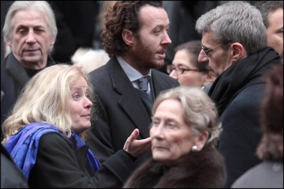 Lambert Wilson et Sophie Barjac aux obsèques de George Wilson à l'Eglise Saint-Roch à Paris (8 février 2010)