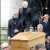Lambert et Jean-Marie Wilson aux obsèques de leur père à l'Eglise Saint-Roch à Paris (8 février 2010)