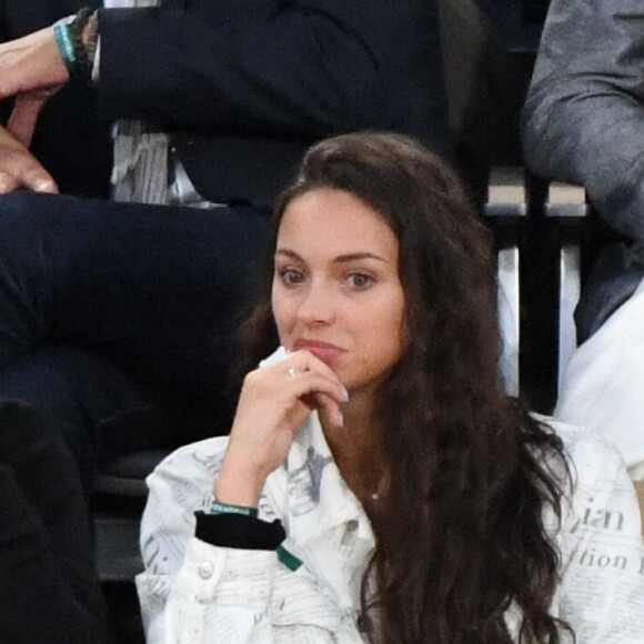 Yannick Noah et sa fille Jenaye Noah - Célébrités dans les tribunes des internationaux de France de Roland Garros à Paris le 30 mai 2022. 