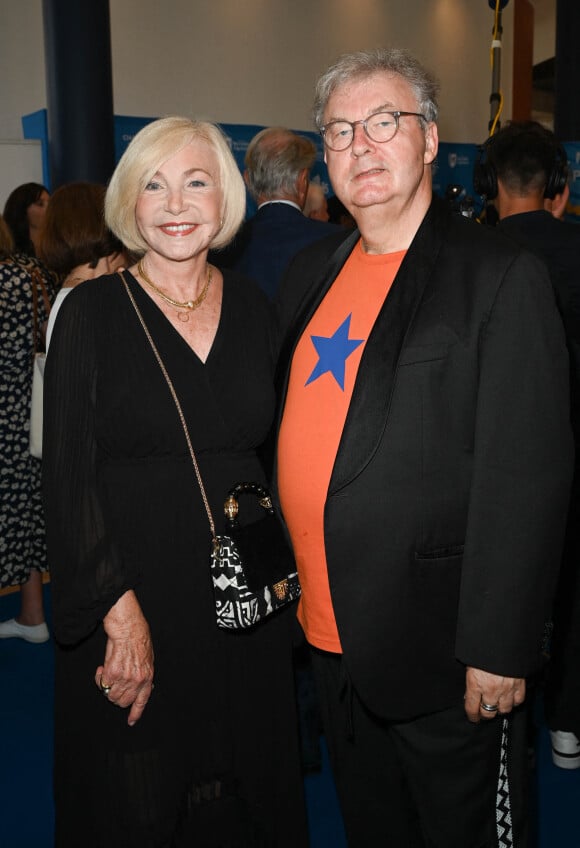 Michèle Torr et Dominique Besnehard au photocall lors de la soirée d'ouverture lors du 15ème festival du film francophone d'Angoulême le 23 août 2022. © Coadic Guirec / Bestimage 