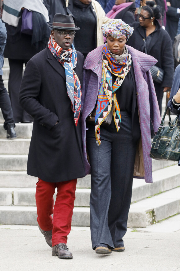 Lilian Thuram et sa compagne Kareen Guiock - Arrivées et sorties des obsèques de Jean-Michel Martial au cimetière du Père Lachaise à Paris. Le 23 octobre 2019