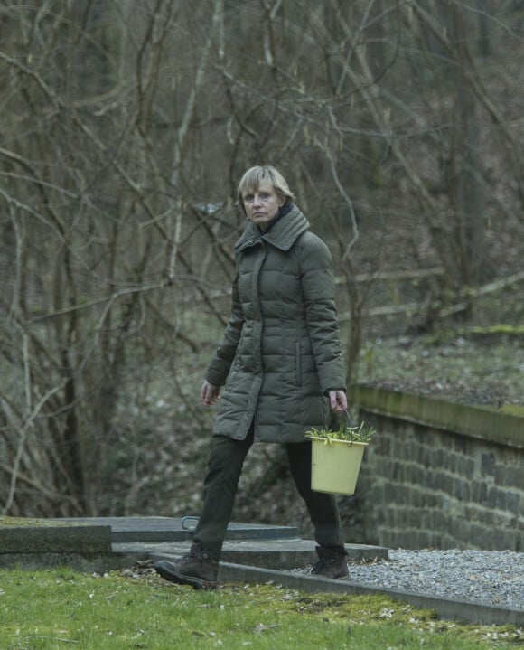 Exclusif - Michelle Martin (ex-femme de Marc Dutroux) se promène dans les sous-bois de Namur en Belgique le le 2 mars 2014