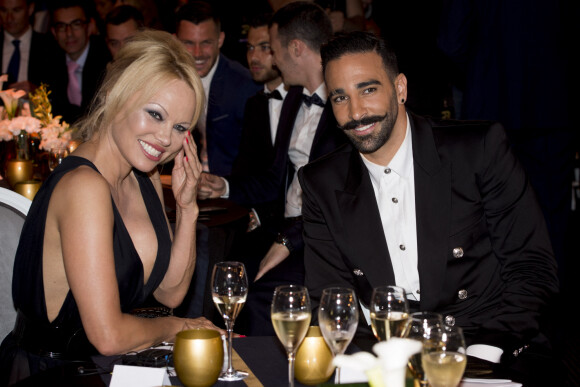 Adil Rami et sa compagne Pamela Anderson lors de la soirée de la 28ème cérémonie des trophées UNFP (Union nationale des footballeurs professionnels) au Pavillon d'Armenonville à Paris, France, le 19 mai 2019. 