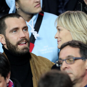 Robin Wright et son ex-mari Clément Giraudet assistent au huitième de finale retour de Ligue des Champion, du Paris Saint-Germain contre le Real Madrid au Parc des Princes à Paris le 6 mars 2018. © Cyril Moreau/Bestimage