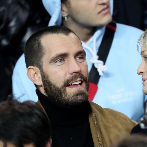 Robin Wright et son ex-mari Clément Giraudet assistent au huitième de finale retour de Ligue des Champion, du Paris Saint-Germain contre le Real Madrid au Parc des Princes à Paris le 6 mars 2018. © Cyril Moreau/Bestimage