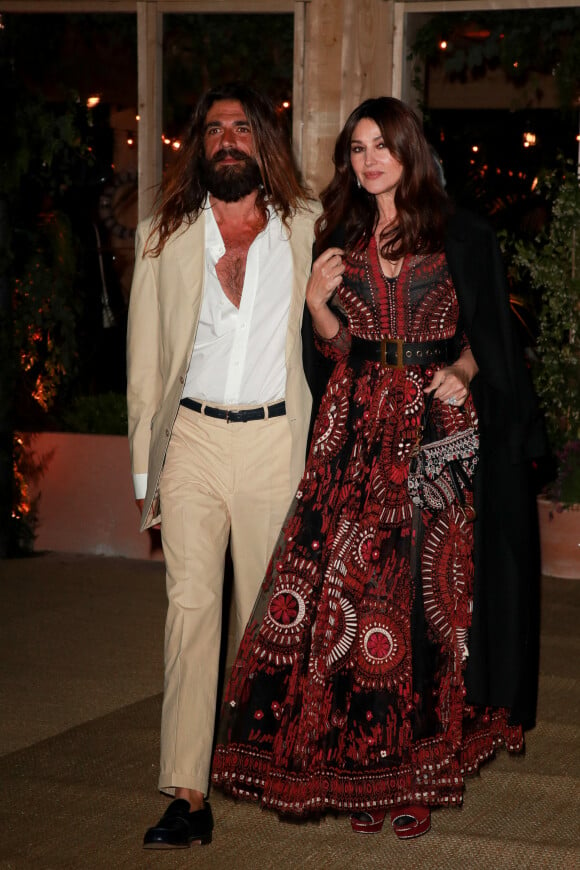 Monica Bellucci (habillée en Dior) et Nicolas Lefebvre à la sortie de la soirée "Dior Vogue" chez "Fred l'écailler" lors du 72ème Festival International du Film de Cannes, le 15 mai 2019.