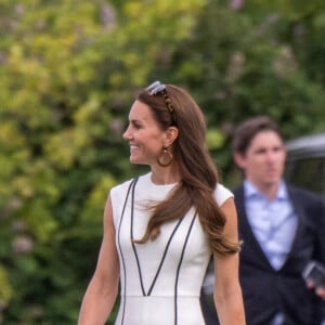 Le prince William, duc de Cambridge, et Catherine (Kate) Middleton, duchesse de Cambridge, assistent au match de polo caritatif Out-Sourcing Inc au Guards Polo Club, Smiths Lawn à Windsor le 6 juillet 2022. 