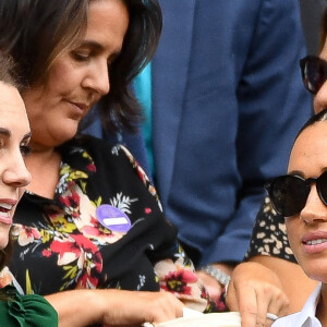 Archives - Catherine (Kate) Middleton, duchesse de Cambridge, Meghan Markle, duchesse de Sussex, sont dans les tribunes lors de la finale femme de Wimbledon "Serena Williams - Simona Halep (2/6 - 2/6) à Londres le 13 juillet 2019. © Chryslène Caillaud / Panoramic / Bestimage 