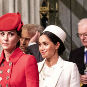 Catherine Kate Middleton, duchesse de Cambridge, Meghan Markle, enceinte, duchesse de Sussex lors de la messe en l'honneur de la journée du Commonwealth à l'abbaye de Westminster à Londres le 11 mars 2019. 