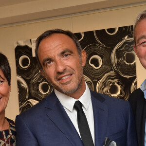 Nikos Aliagas, Laurence et Pierre Lemarchal (Parents de Grégory Lemarchal) - Vernissage de l'exposition de Nikos Aliagas "Mémoires de Mains" à la Galerie Guillaume à Paris, France, le 20 septembre 2016. Exposition au profit de l'association "Grégory Lemarchal". © Veeren/Bestimage